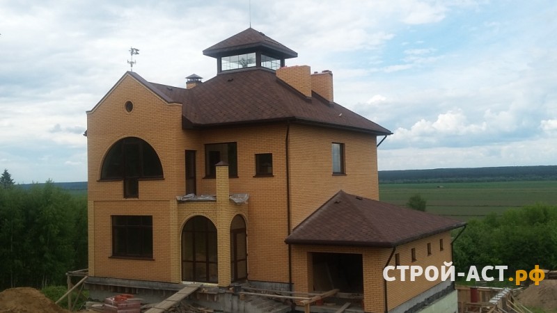 Построить двухэтажный дом с гаражом и эркером с облицовкой из желтого кирпича в Кашире