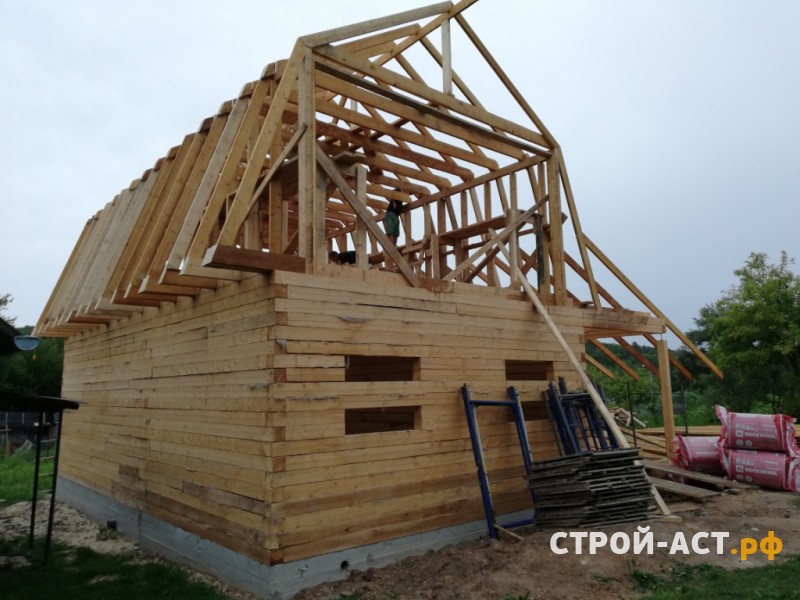 Построить полутораэтажный дом из бруса с мягкой черепицей Деке